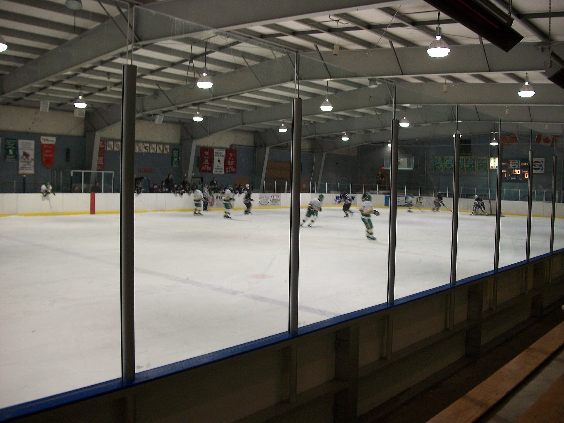 Game night at the Wellesley arena, seen through the glass